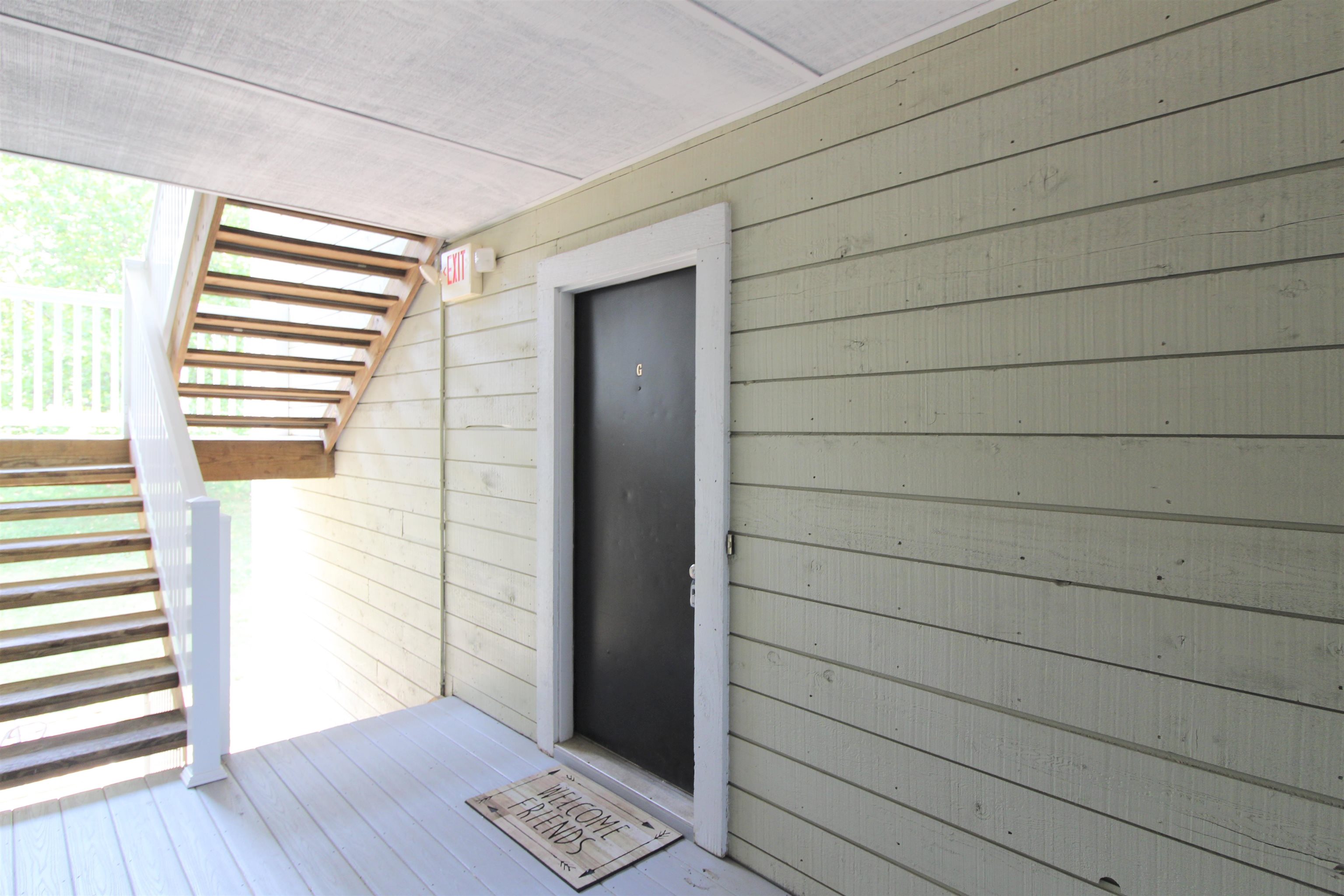 1336 Hunters Road, Unit G Harrisonburg, VA 22801 - Photo 4 of 42 a view of front door with wooden floor
