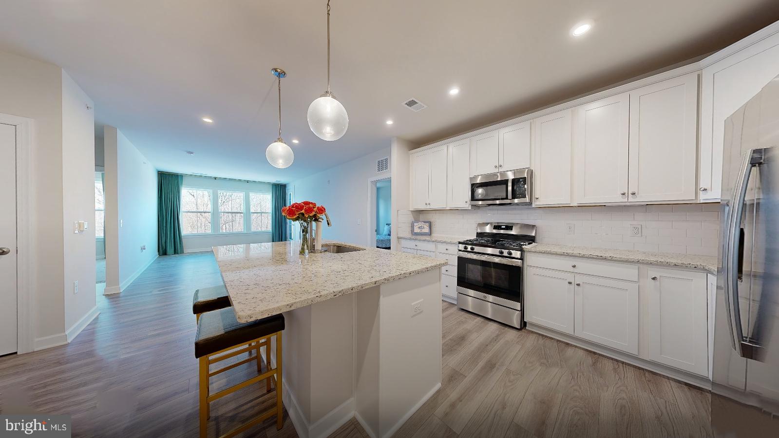 3925 Fair Ridge Drive, Unit 503 Fairfax, VA 22033 - Photo 2 of 37 Open Layout kitchen with Island