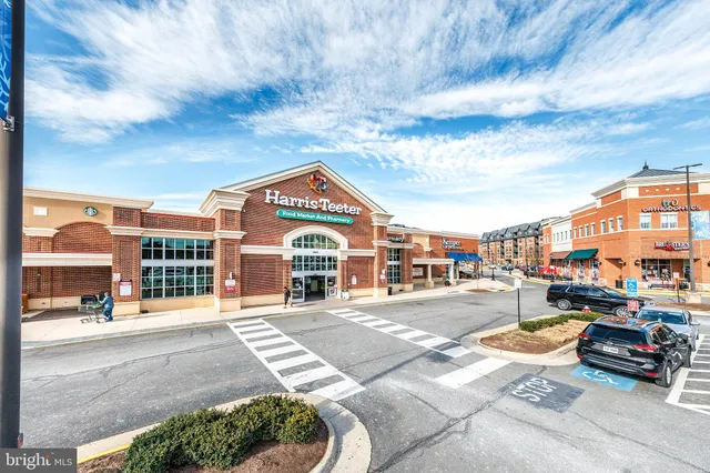 a city view with lot of cars parked