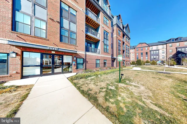 a front view of residential houses with street