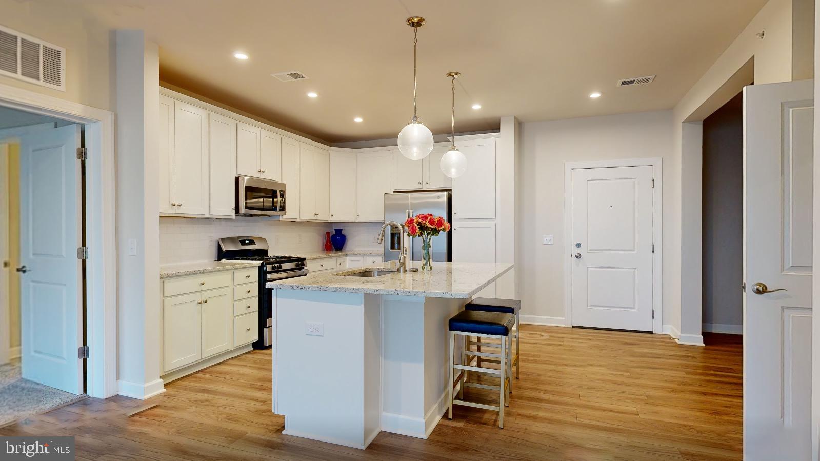 3925 Fair Ridge Drive, Unit 503 Fairfax, VA 22033 - Photo 10 of 37 Kitchen with Island