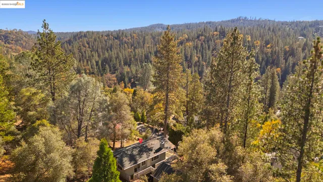 a view of a city with mountains in the background