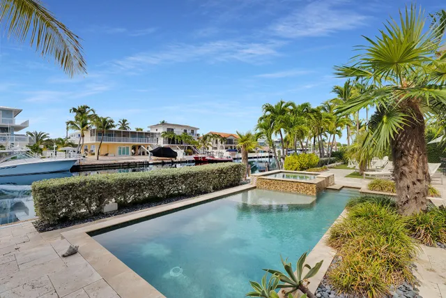 a picture of a living room with a flat screen tv