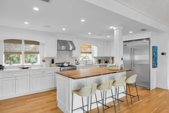 a bedroom with furniture and a flat screen tv
