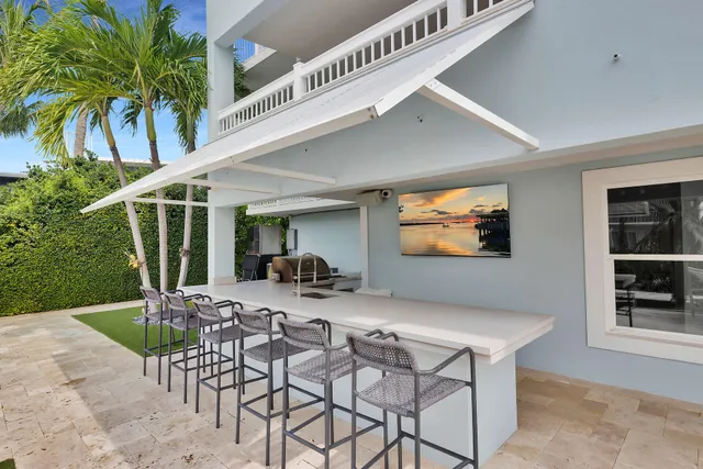 a picture of a living room with a flat screen tv