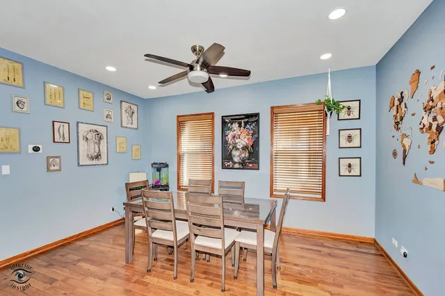 a dining room with furniture and window