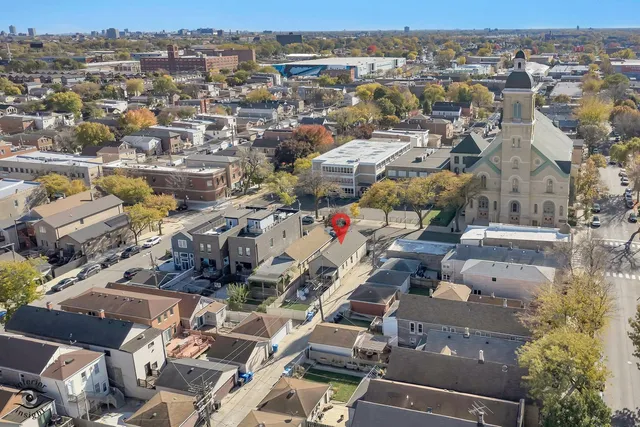 an aerial view of a city with lots of residential buildings