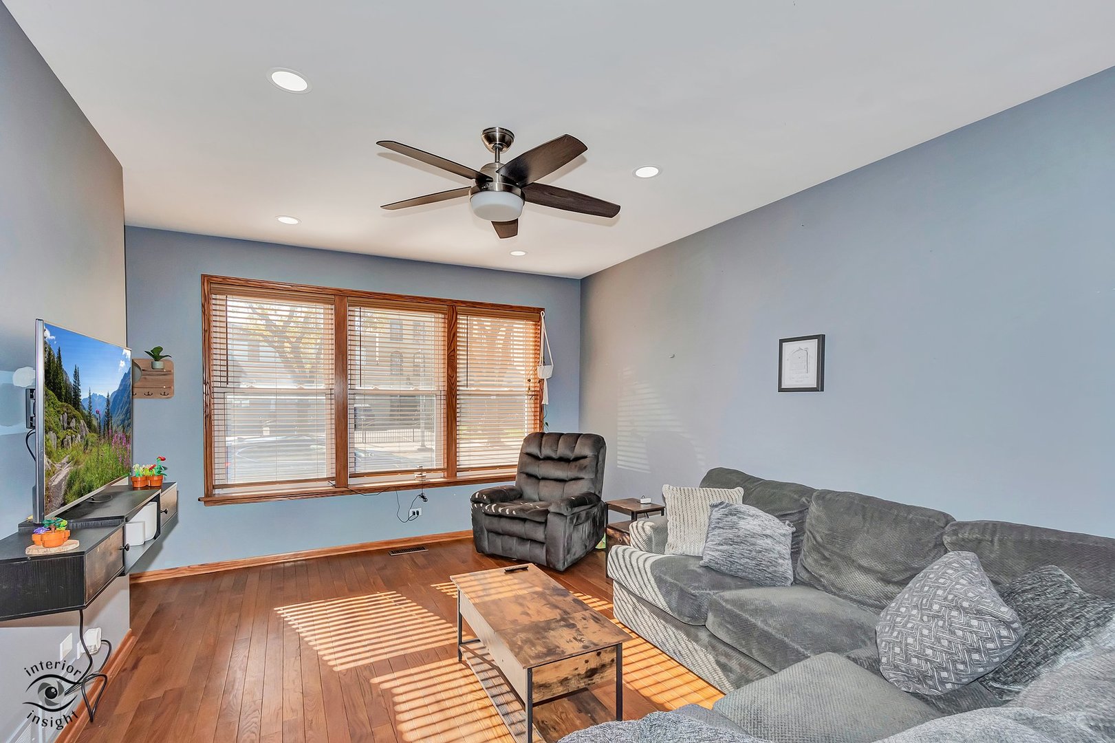 642 West 37th Street Chicago, IL 60609 - Photo 6 of 31 a living room with furniture and a flat screen tv with wooden floor
