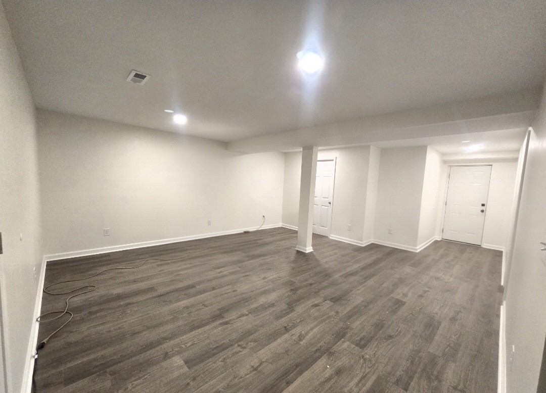 223 Raymond Hodges Road Cottontown, TN 37048 - Photo 26 of 37 a view of an empty room with wooden floor