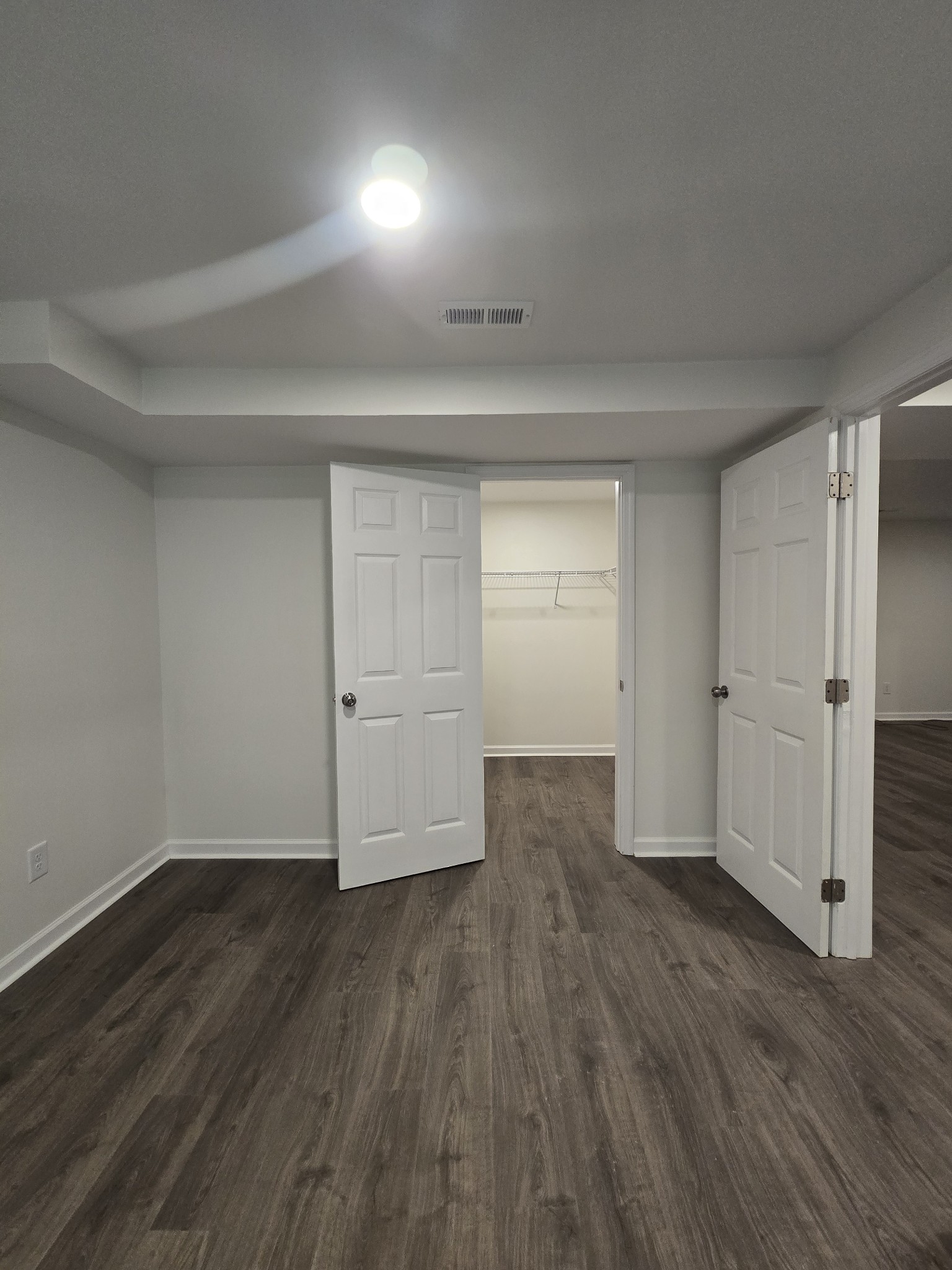 223 Raymond Hodges Road Cottontown, TN 37048 - Photo 28 of 37 wooden floor in an empty room with a window