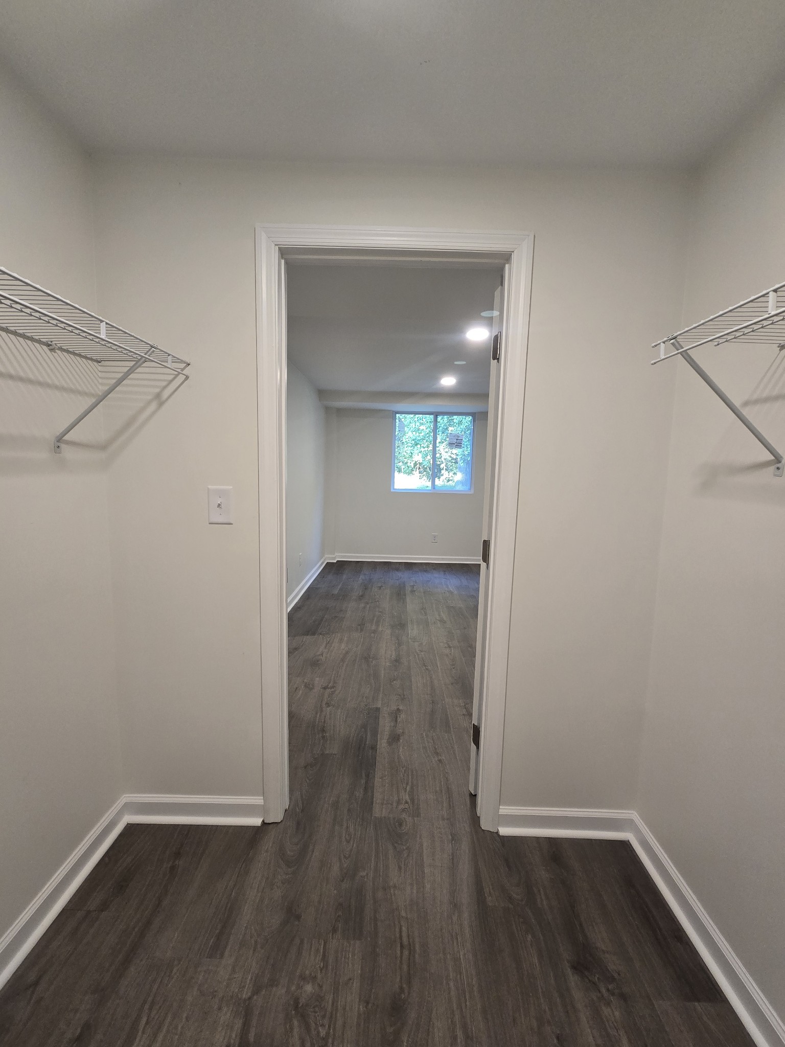223 Raymond Hodges Road Cottontown, TN 37048 - Photo 30 of 37 a view of a room with wooden floor and a window