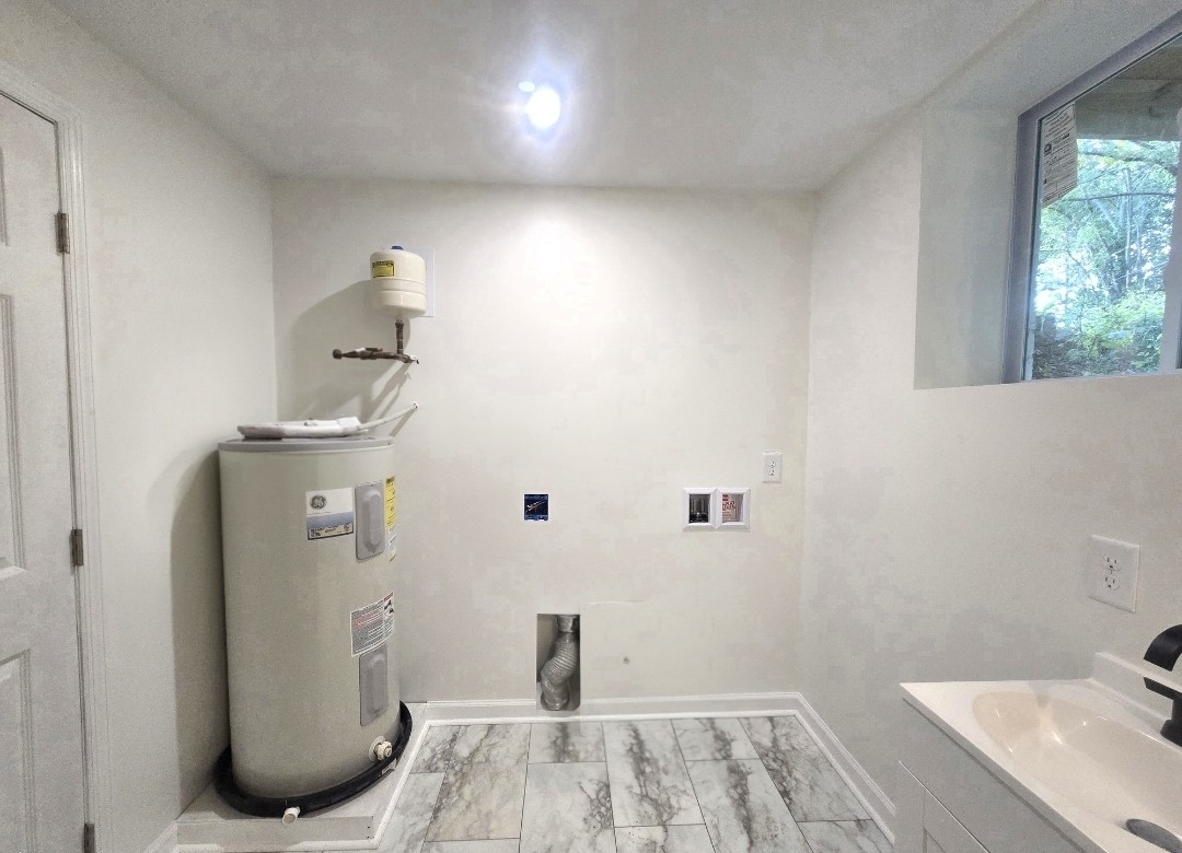 223 Raymond Hodges Road Cottontown, TN 37048 - Photo 33 of 37 a bathroom with a sink and mirror