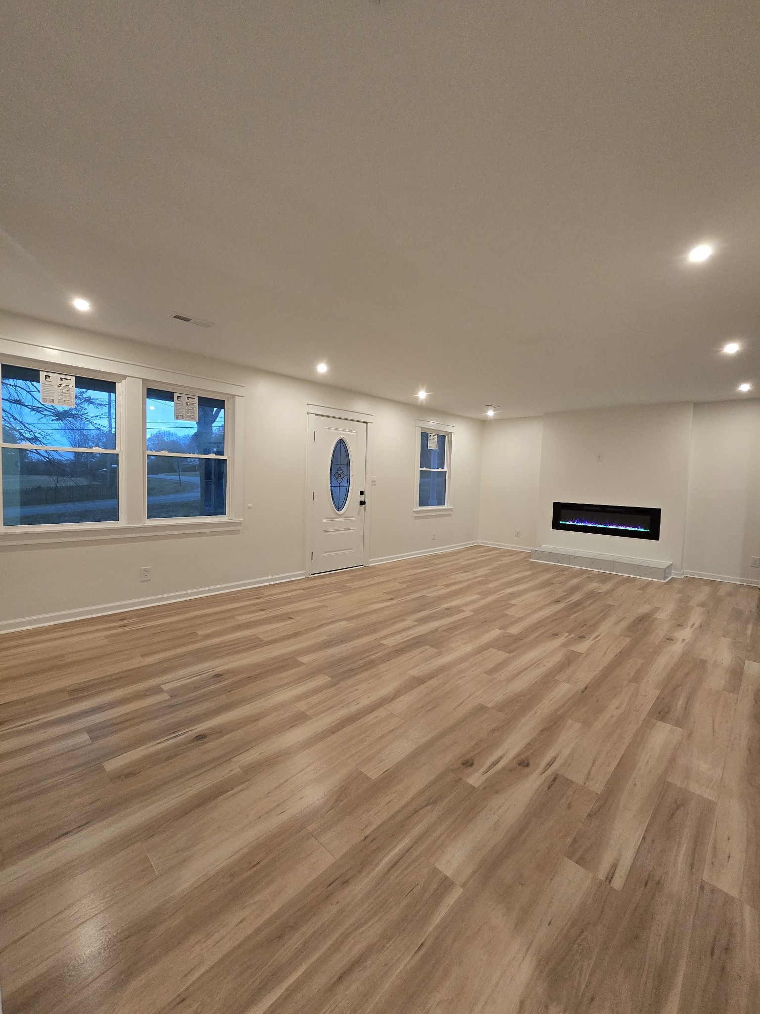 223 Raymond Hodges Road Cottontown, TN 37048 - Photo 5 of 37 a view of an empty room with wooden floor