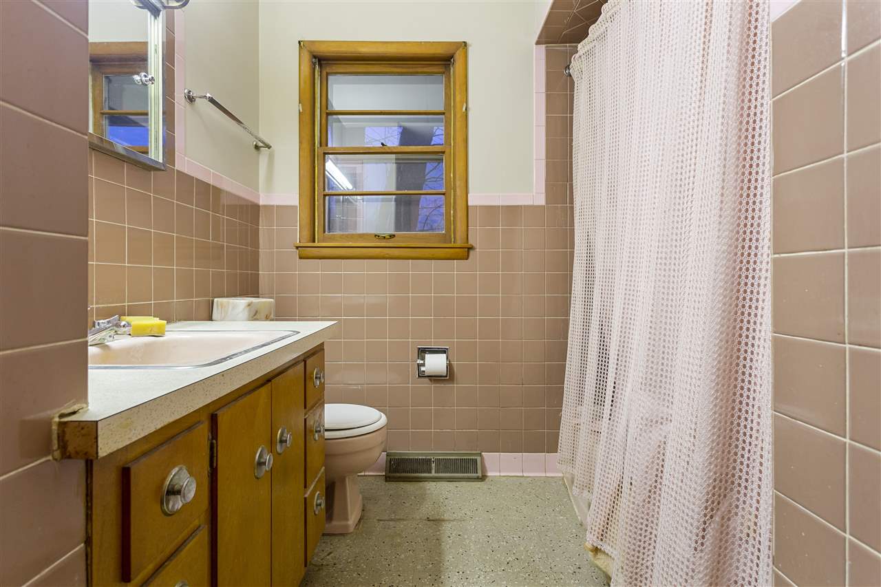 3826 Highcrest Road Rockford, IL 61107 - Photo 11 of 13 a bathroom with a sink toilet and shower