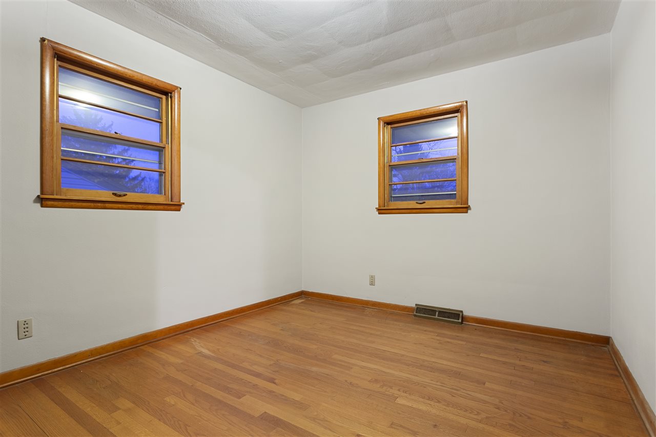 3826 Highcrest Road Rockford, IL 61107 - Photo 12 of 13 a view of empty room with wooden floor