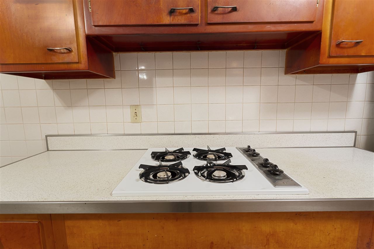3826 Highcrest Road Rockford, IL 61107 - Photo 5 of 13 a close view of sink cabinets and stove