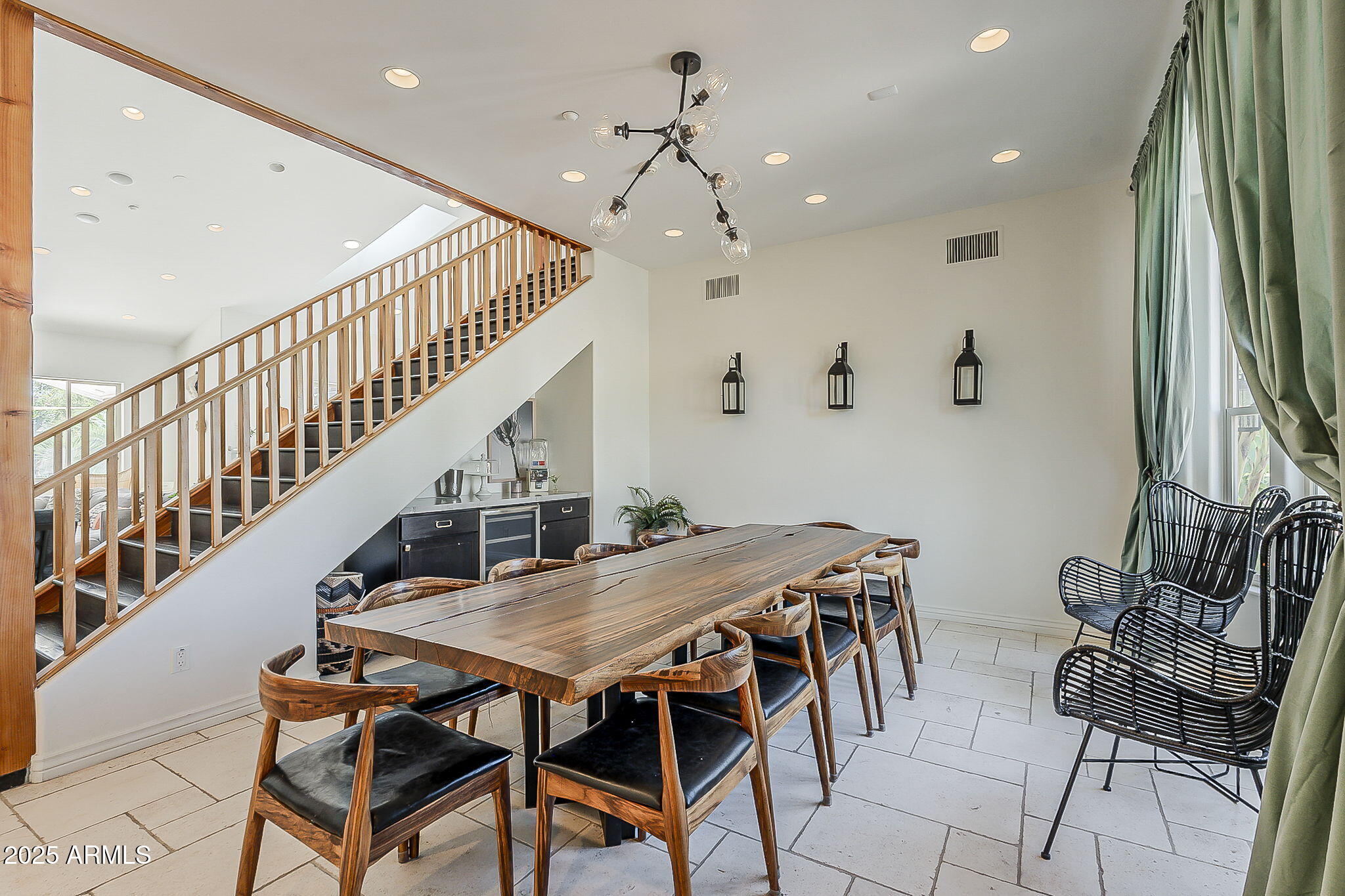 225 West Orchid Lane Phoenix, AZ 85021 - Photo 5 of 70 a view of a dining room with furniture and wooden floor