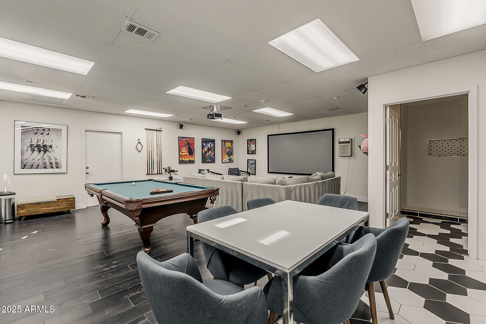 225 West Orchid Lane Phoenix, AZ 85021 - Photo 59 of 70 a living room with furniture and a flat screen tv