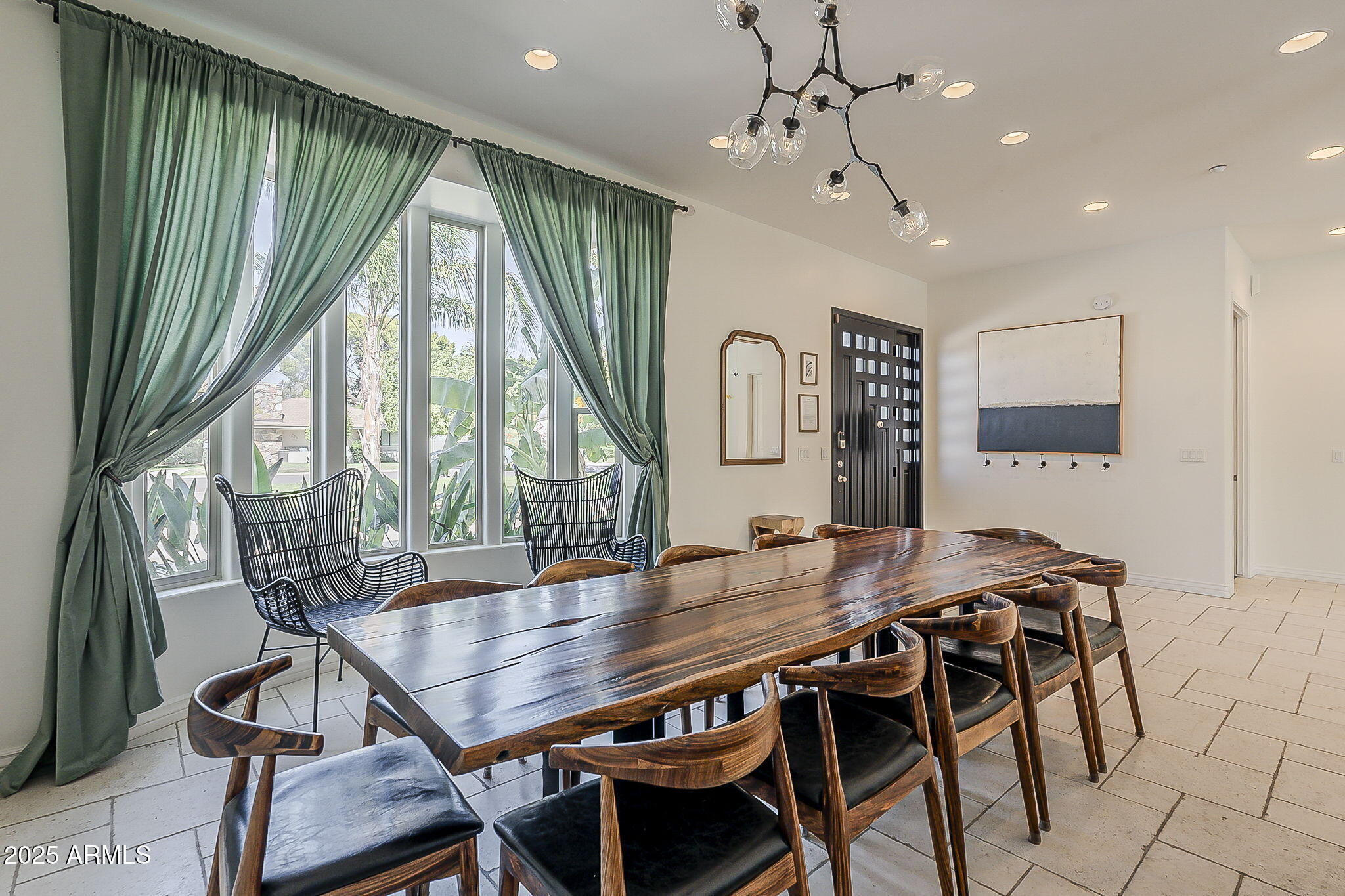 225 West Orchid Lane Phoenix, AZ 85021 - Photo 6 of 70 a view of a dining room with furniture window and wooden floor