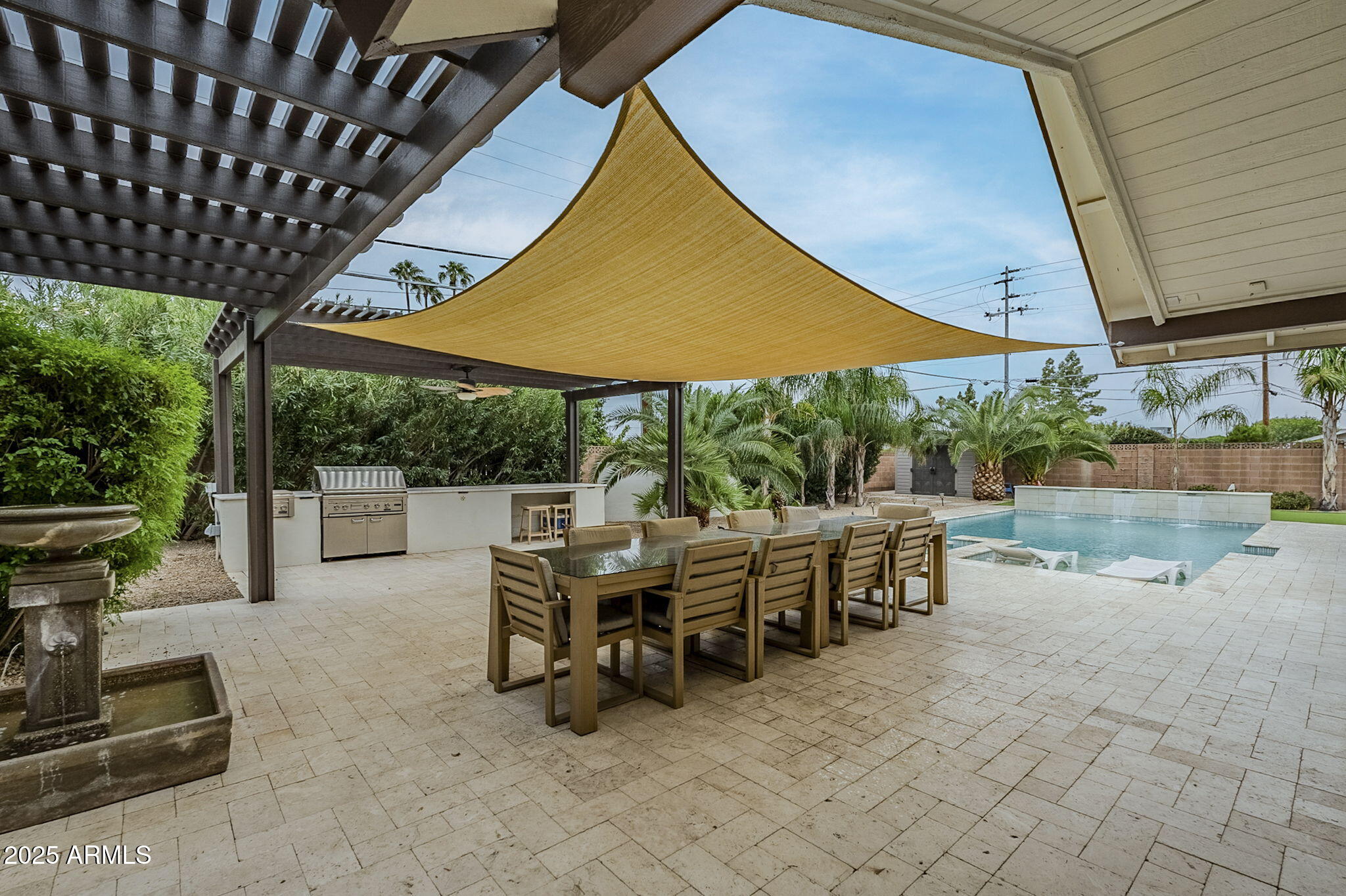 225 West Orchid Lane Phoenix, AZ 85021 - Photo 61 of 70 a patio with yard table and chairs