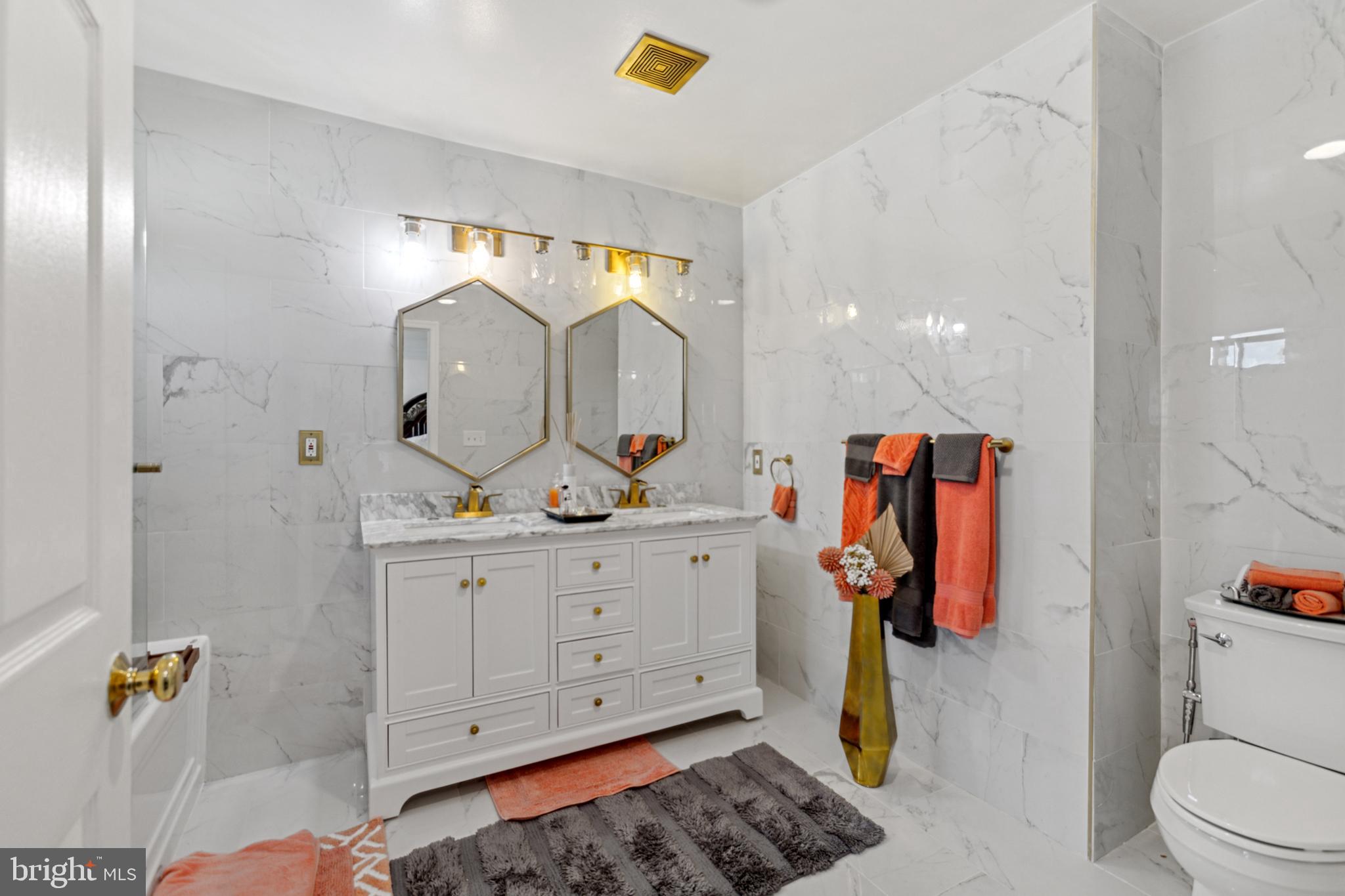 17 Brook Ramble Lane Townsend, DE 19734 - Photo 13 of 35 a spacious bathroom with a double vanity sink and a mirror