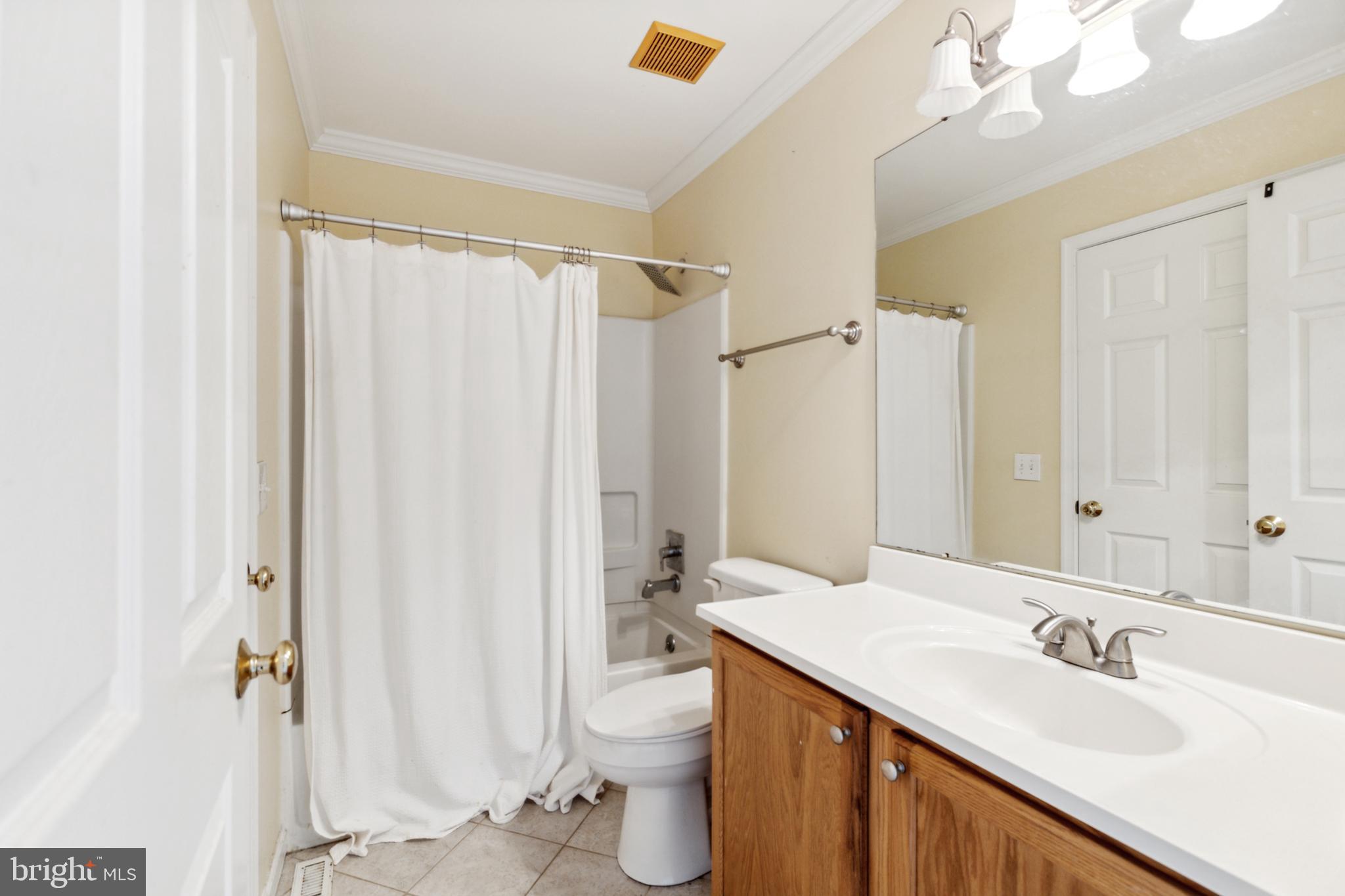 17 Brook Ramble Lane Townsend, DE 19734 - Photo 16 of 35 a bathroom with a double vanity sink toilet and shower