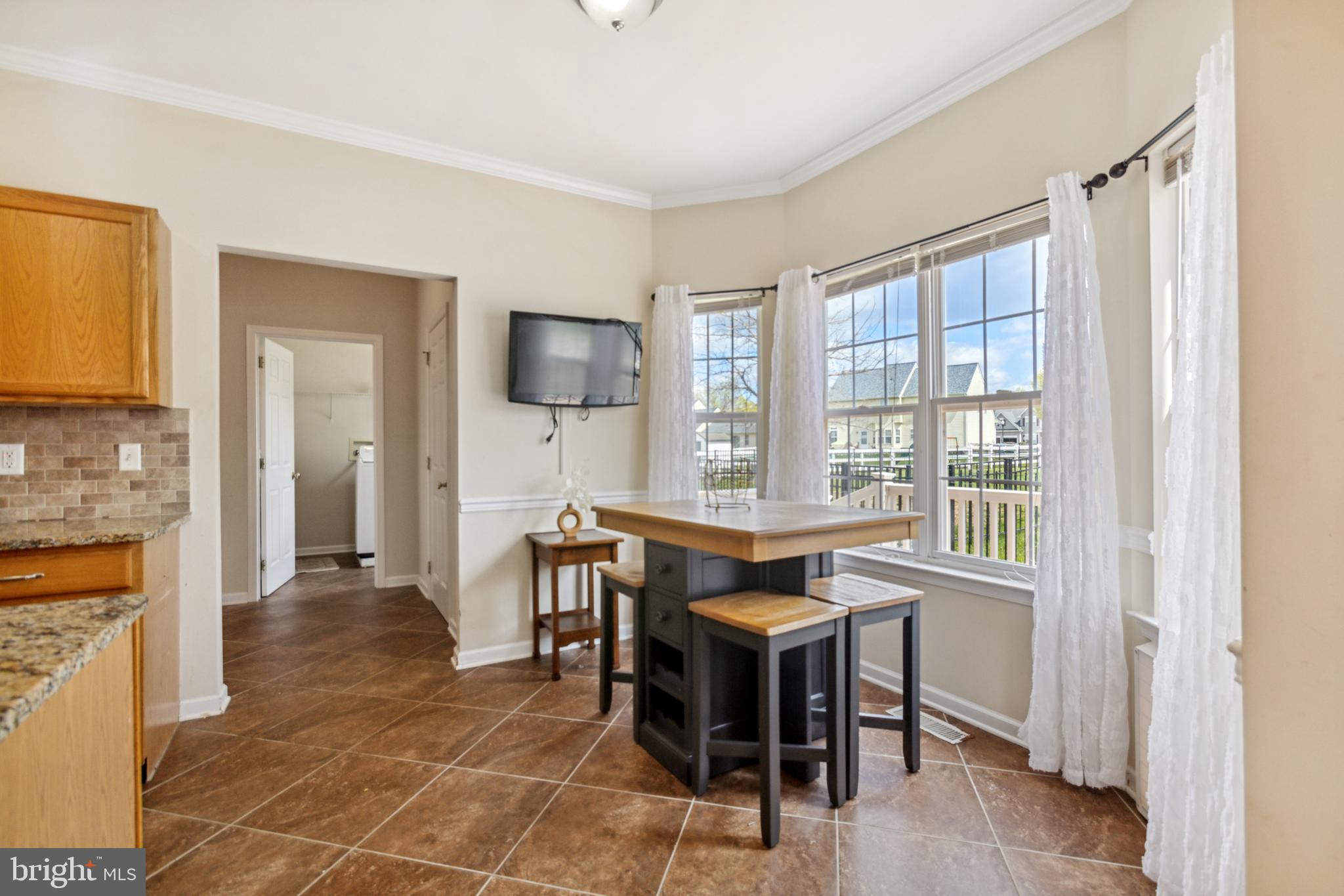 17 Brook Ramble Lane Townsend, DE 19734 - Photo 19 of 35 a view of a livingroom with furniture window and a kitchen