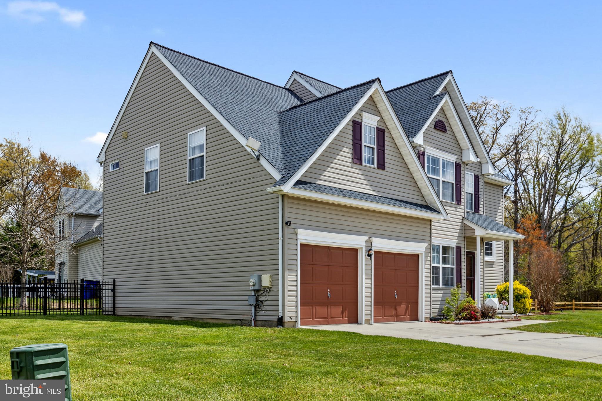 17 Brook Ramble Lane Townsend, DE 19734 - Photo 2 of 35 a front view of a house with a yard