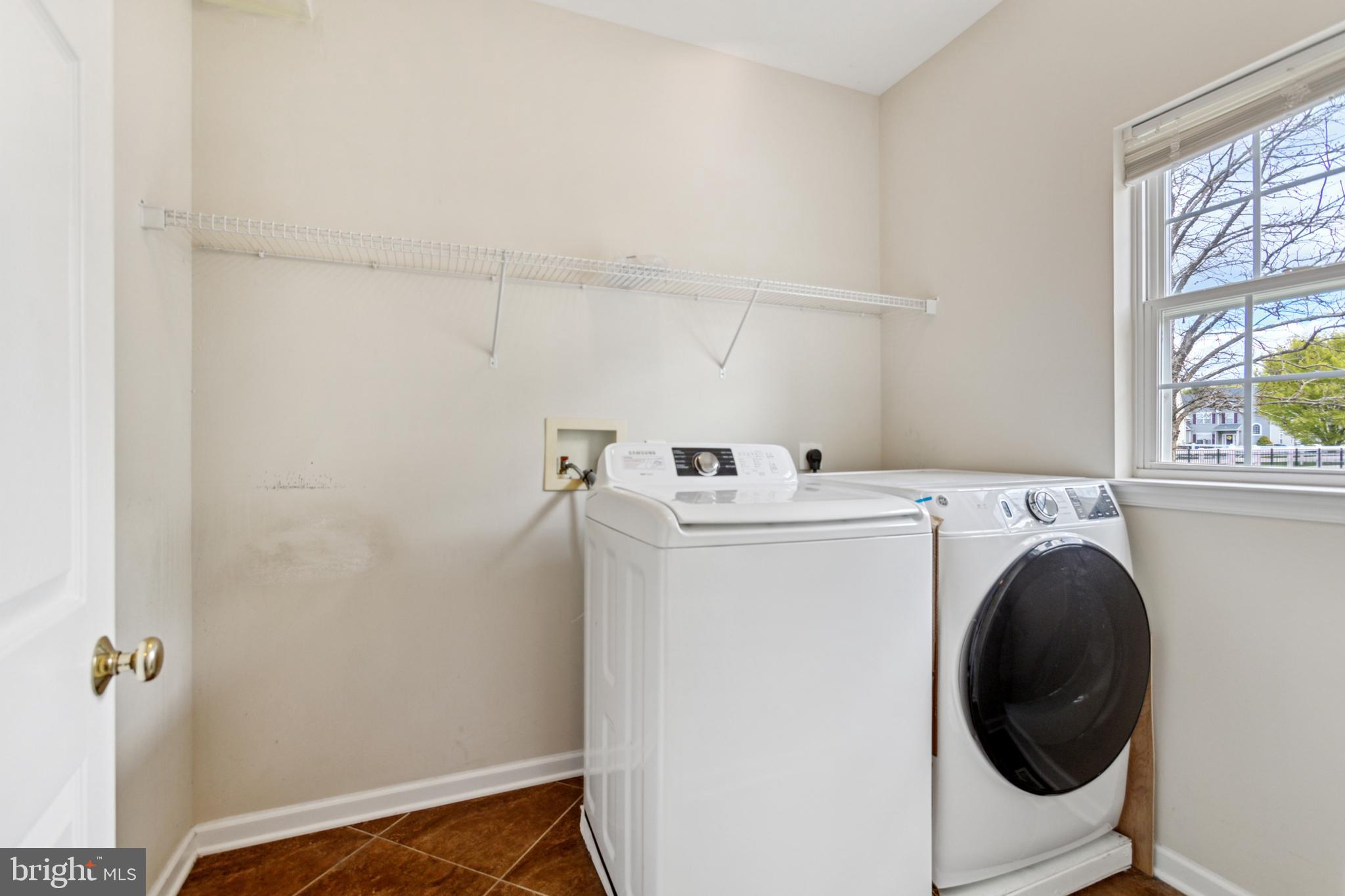 17 Brook Ramble Lane Townsend, DE 19734 - Photo 22 of 35 a utility room with dryer and washer