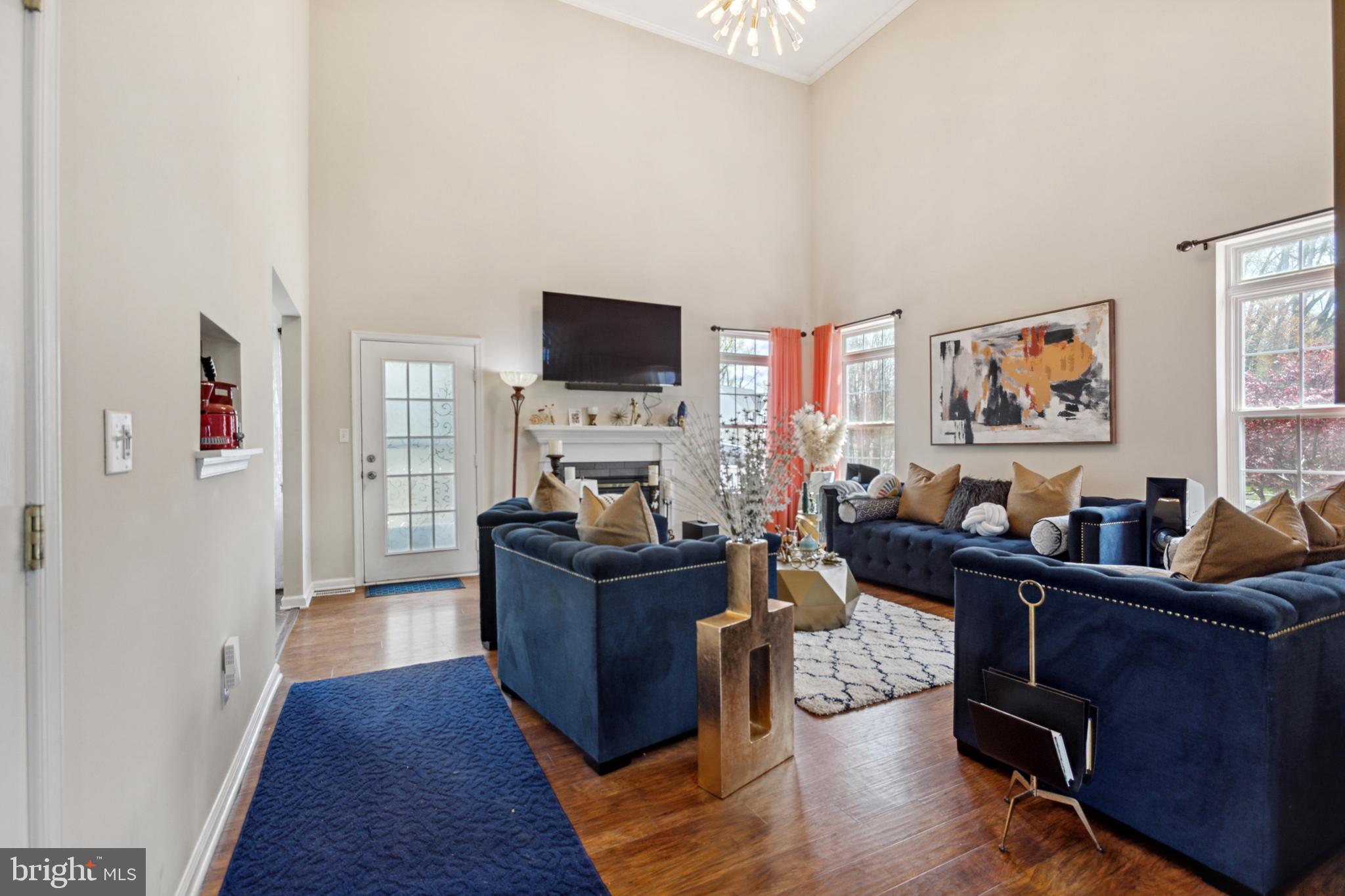 17 Brook Ramble Lane Townsend, DE 19734 - Photo 24 of 35 a living room with furniture and a flat screen tv