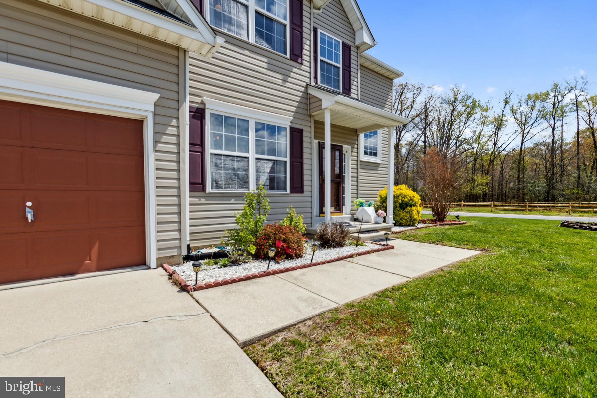 17 Brook Ramble Lane Townsend, DE 19734 - Photo 29 of 35 front view of a house with a yard