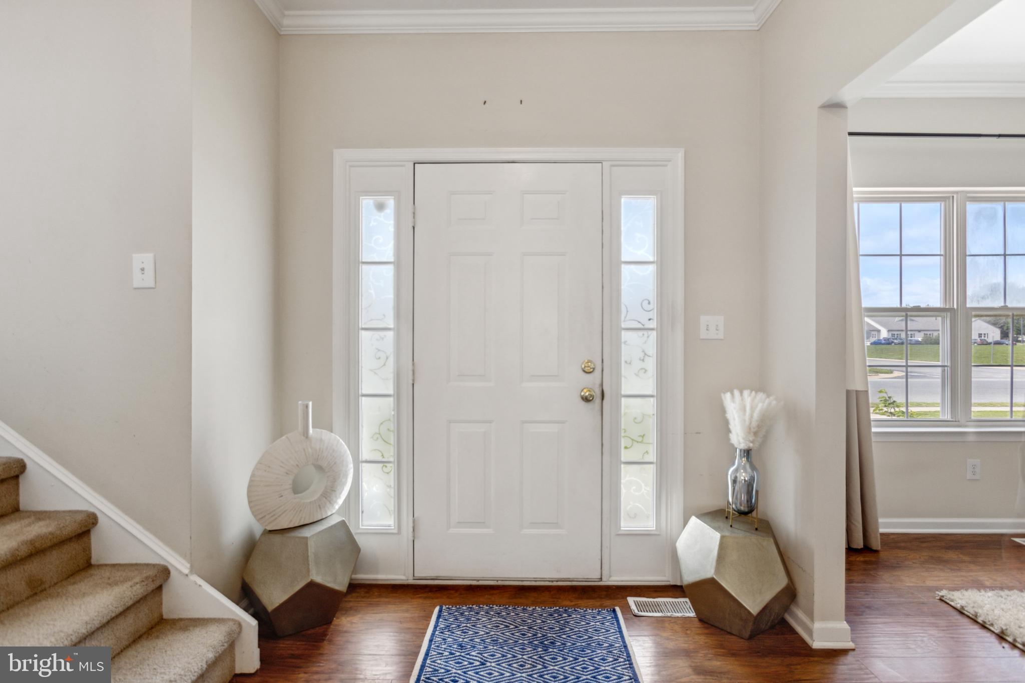 17 Brook Ramble Lane Townsend, DE 19734 - Photo 5 of 35 a view of livingroom with furniture and wooden floor