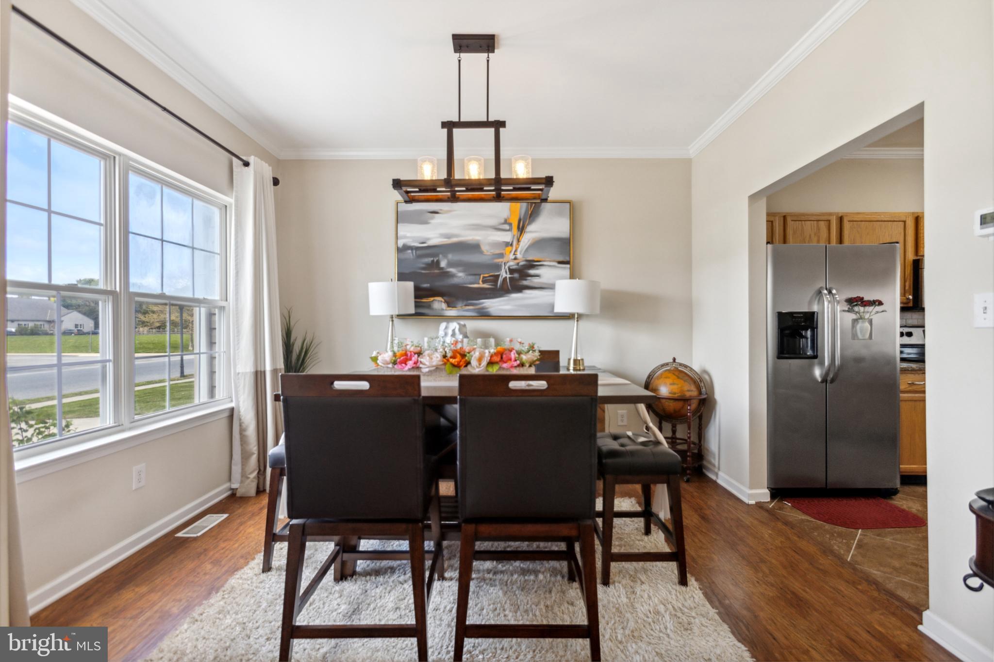 17 Brook Ramble Lane Townsend, DE 19734 - Photo 8 of 35 a view of a dining room with furniture window and outside view
