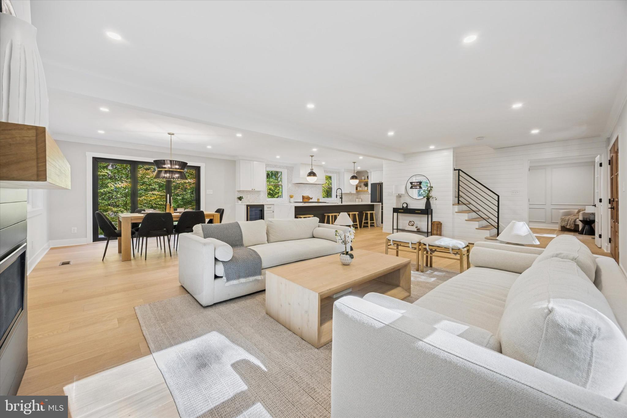 3053 Sidley Hill Road Malvern, PA 19355 - Photo 2 of 53 a living room with furniture white walls and a fireplace