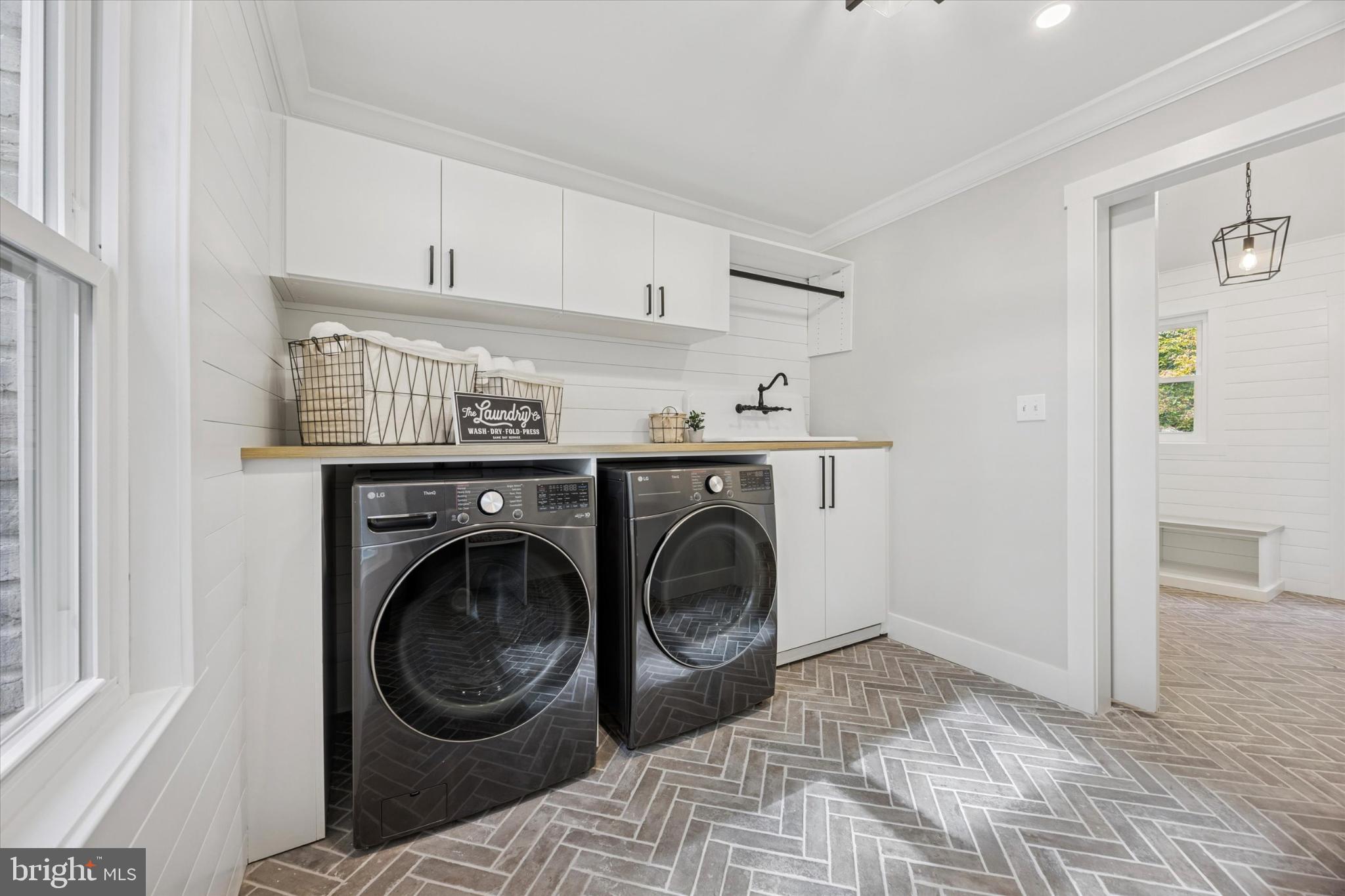 3053 Sidley Hill Road Malvern, PA 19355 - Photo 24 of 53 a utility room with sink dryer and washer