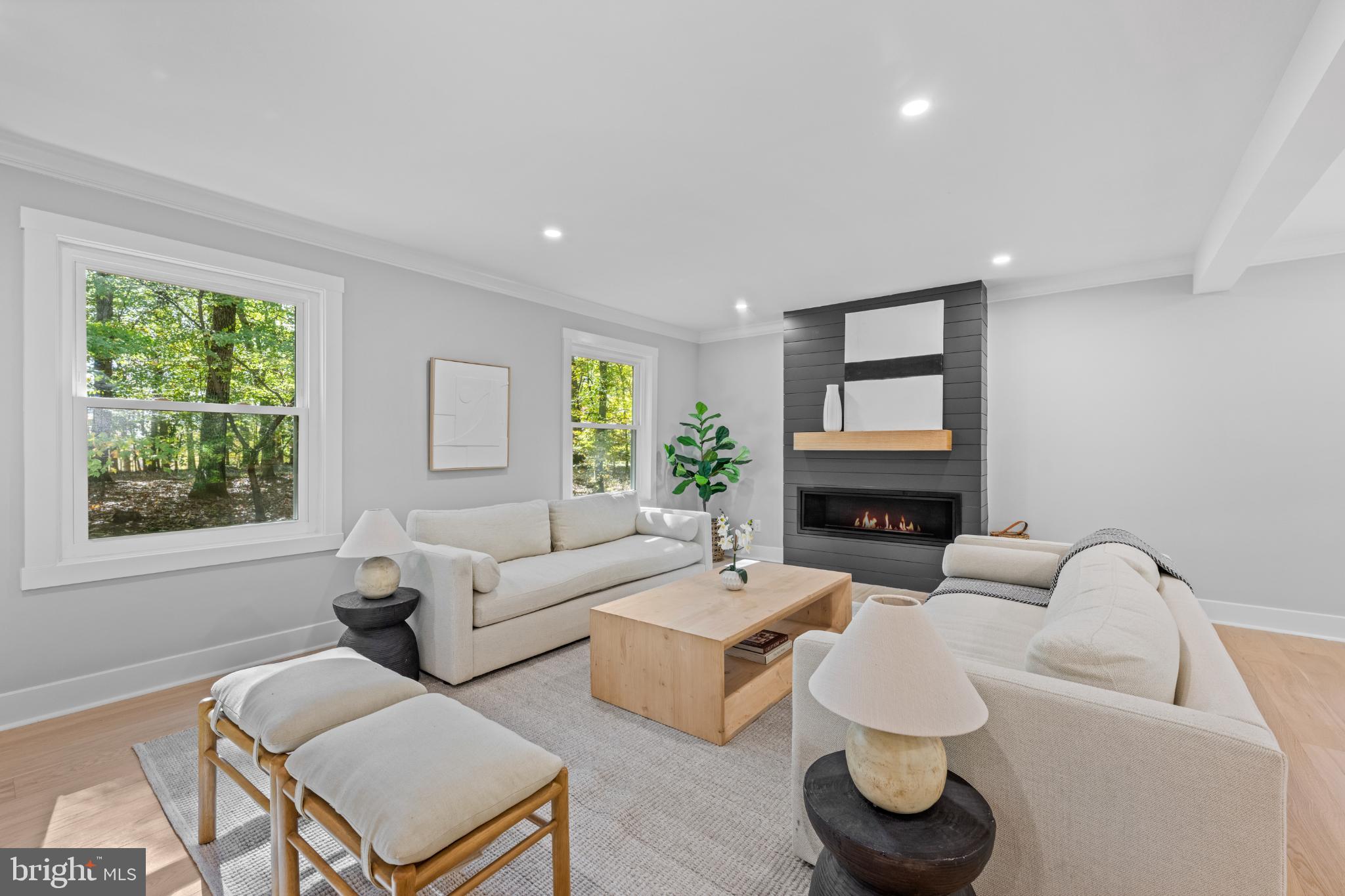 3053 Sidley Hill Road Malvern, PA 19355 - Photo 3 of 53 a living room with furniture and a fireplace
