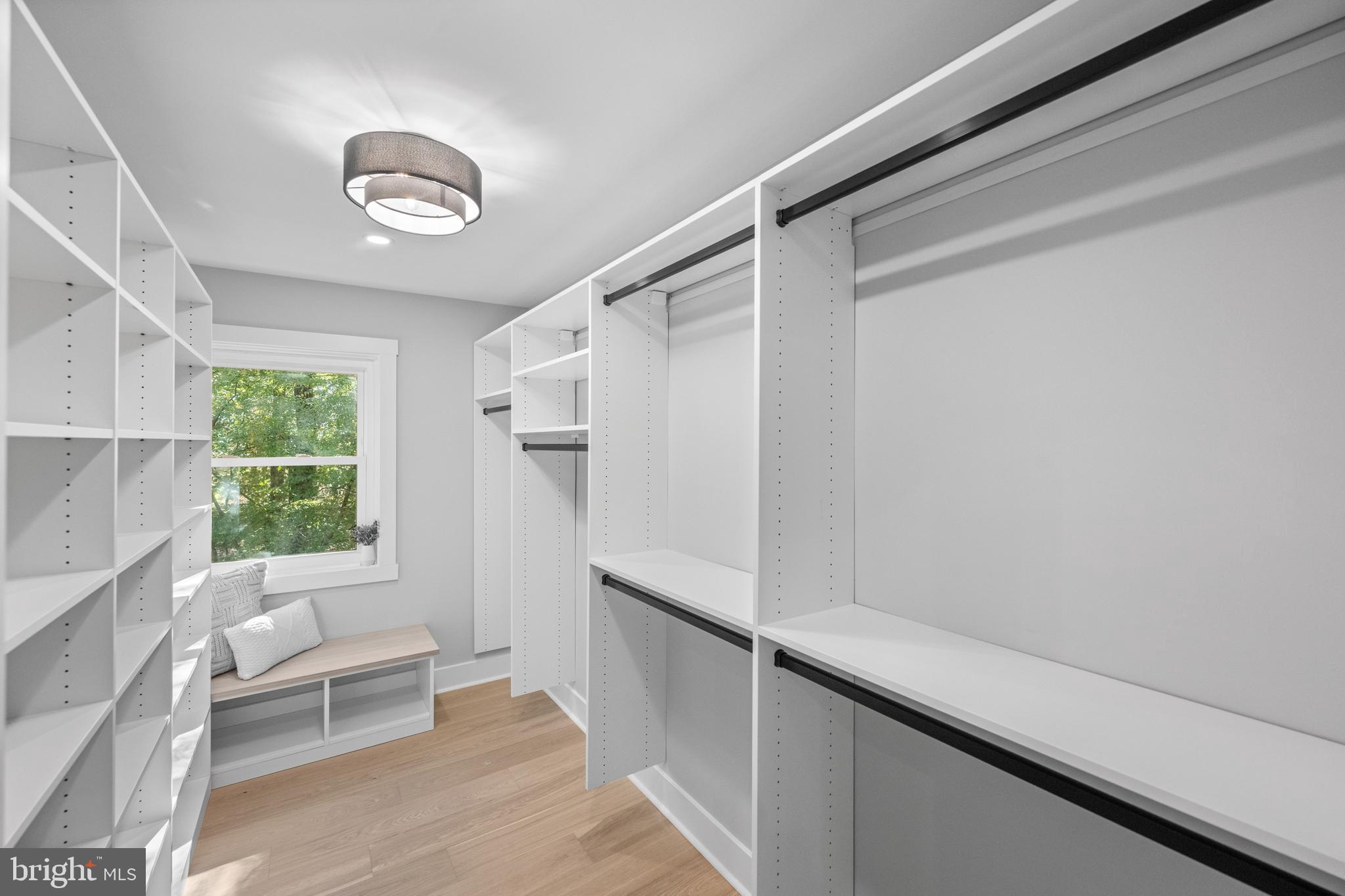 3053 Sidley Hill Road Malvern, PA 19355 - Photo 37 of 53 a hallway with a large window and a couch