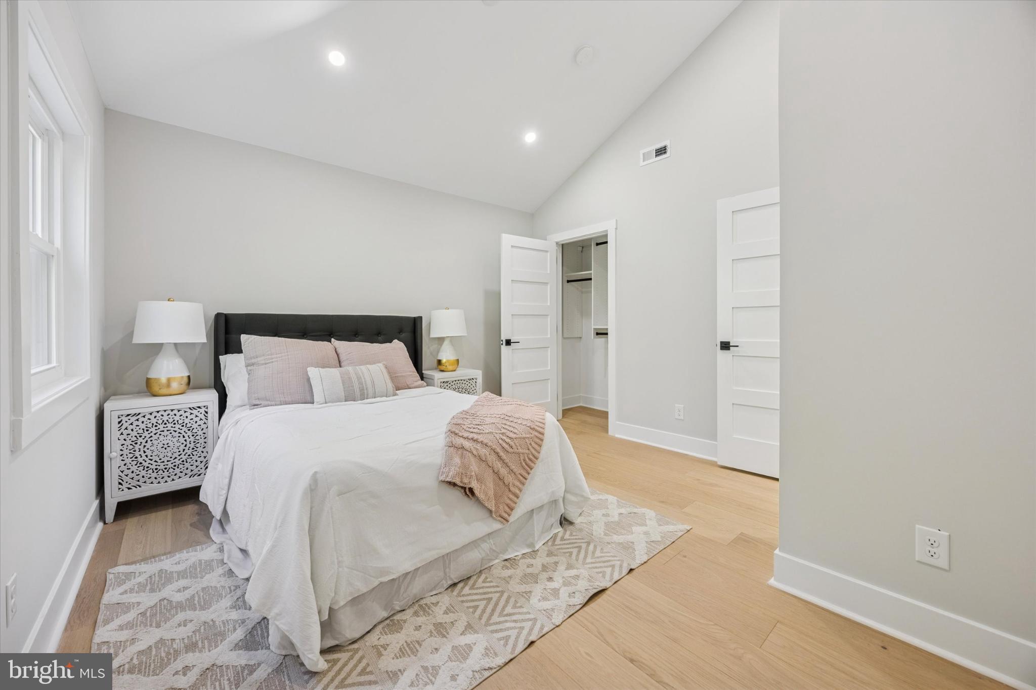 3053 Sidley Hill Road Malvern, PA 19355 - Photo 38 of 53 a bedroom with a bed and a night lamp