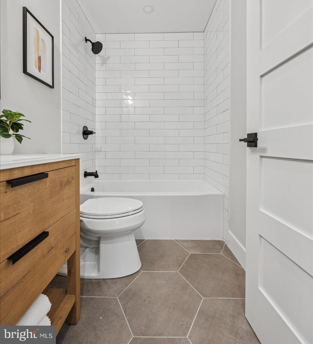 3053 Sidley Hill Road Malvern, PA 19355 - Photo 40 of 53 a bathroom with a toilet and a shower