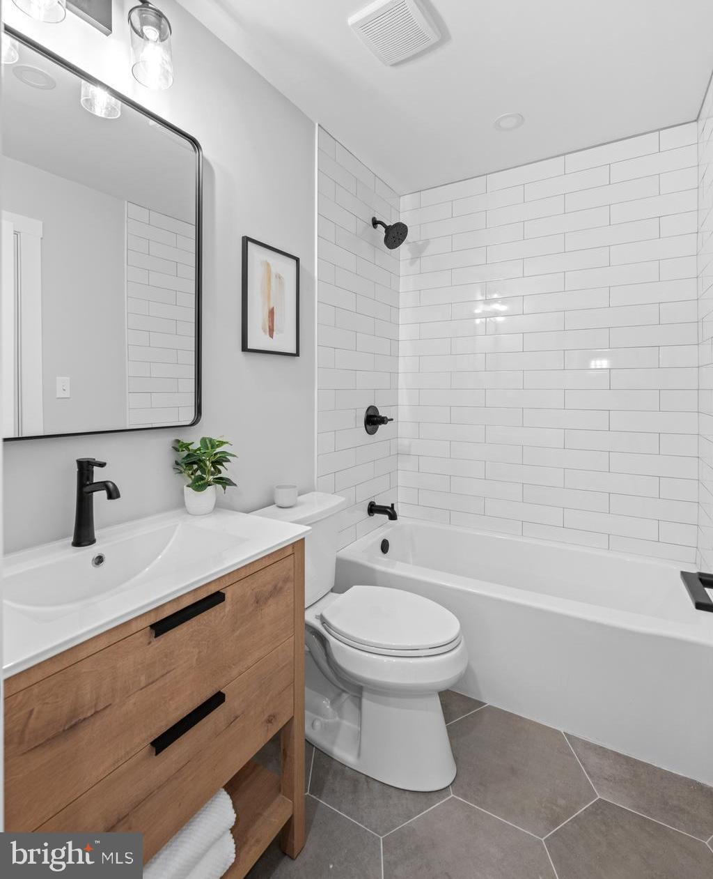 3053 Sidley Hill Road Malvern, PA 19355 - Photo 41 of 53 a bathroom with a sink toilet and shower