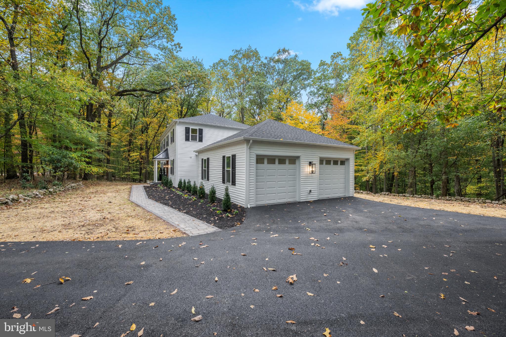 3053 Sidley Hill Road Malvern, PA 19355 - Photo 49 of 53 a view of a house with a yard and large tree