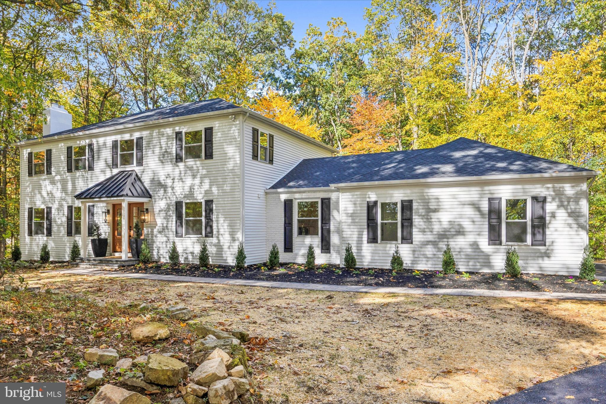 3053 Sidley Hill Road Malvern, PA 19355 - Photo 53 of 53 a front view of a house with a yard