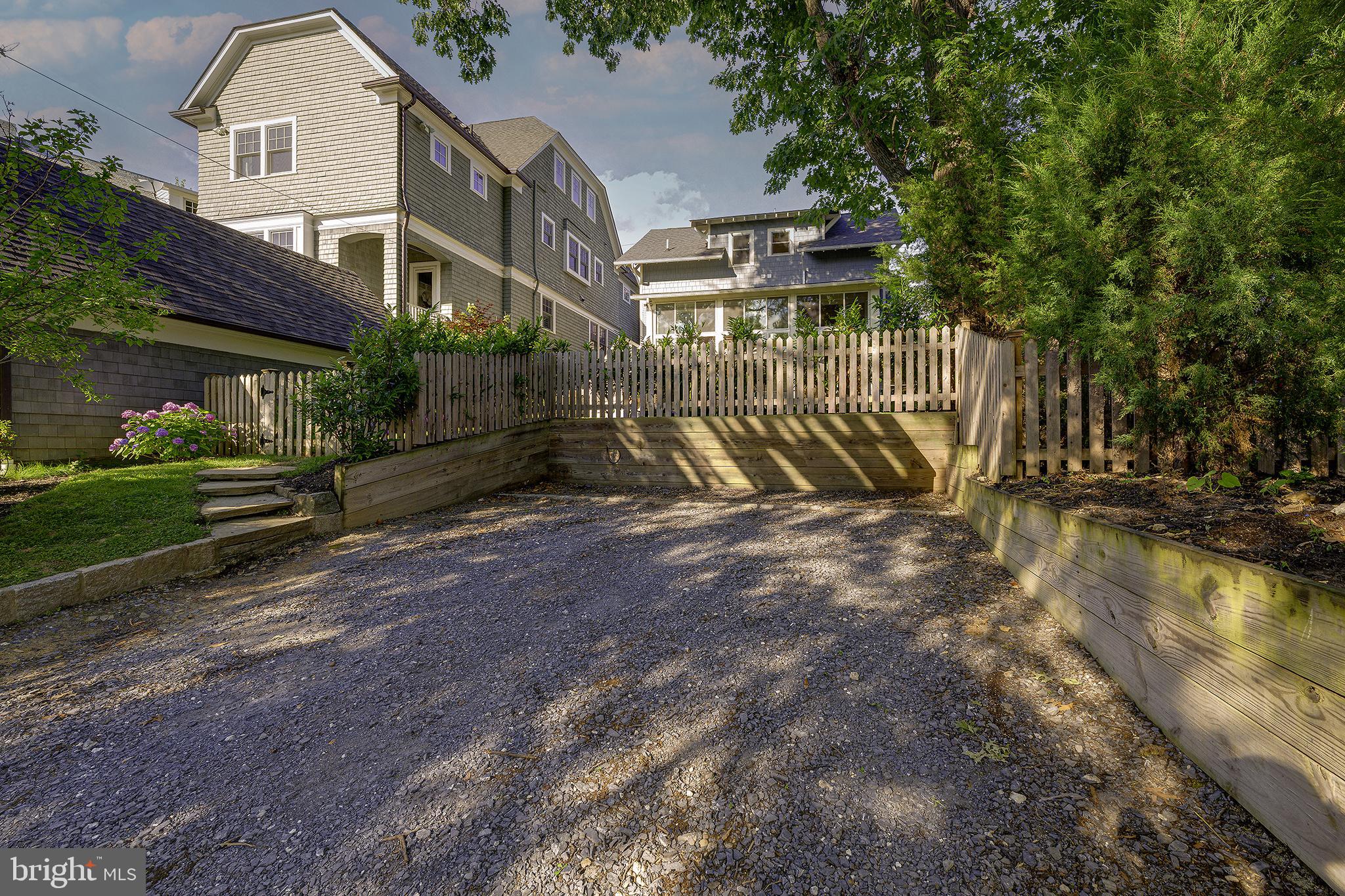 5710 Broad Branch Road Northwest Washington, DC 20015 - Photo 24 of 25 a view of a house with a yard