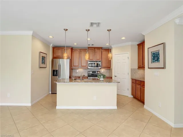 en empty room with window and ceiling fan