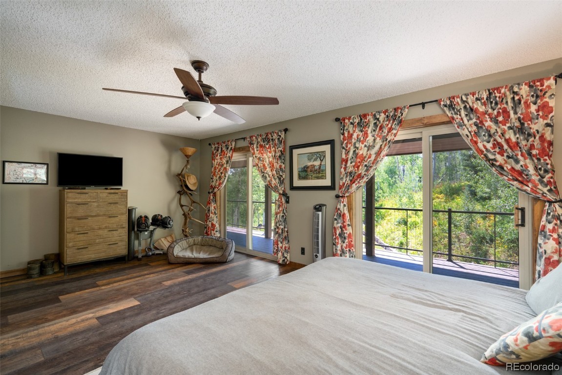 58195 Jupiter Place Clark, CO 80428 - Photo 16 of 29 a view of a livingroom with furniture and windows