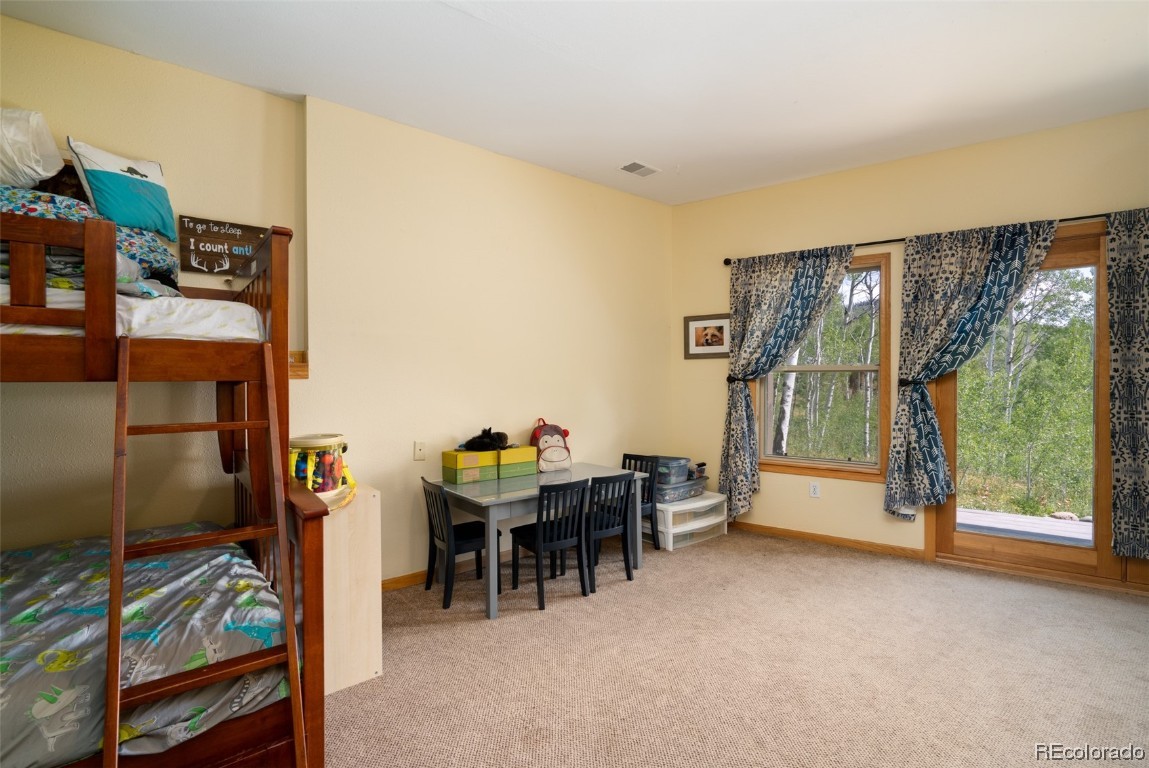 58195 Jupiter Place Clark, CO 80428 - Photo 21 of 29 a view of a livingroom with furniture and window