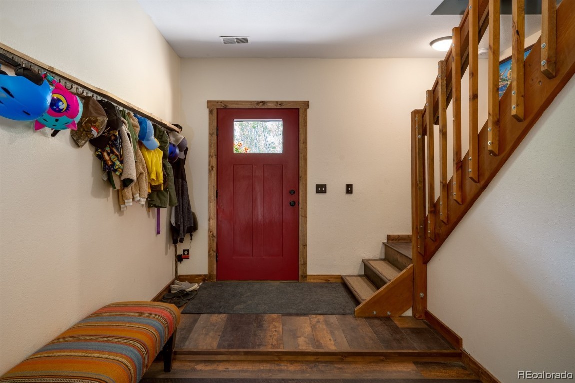 58195 Jupiter Place Clark, CO 80428 - Photo 24 of 29 a view of staircase with white walls