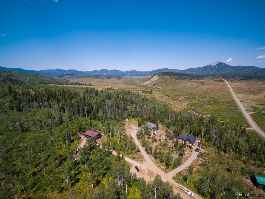 58195 Jupiter Place Clark, CO 80428 - Photo 29 of 29 a view of a lake with a mountain in the background