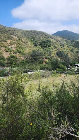 a view of mountain and mountains