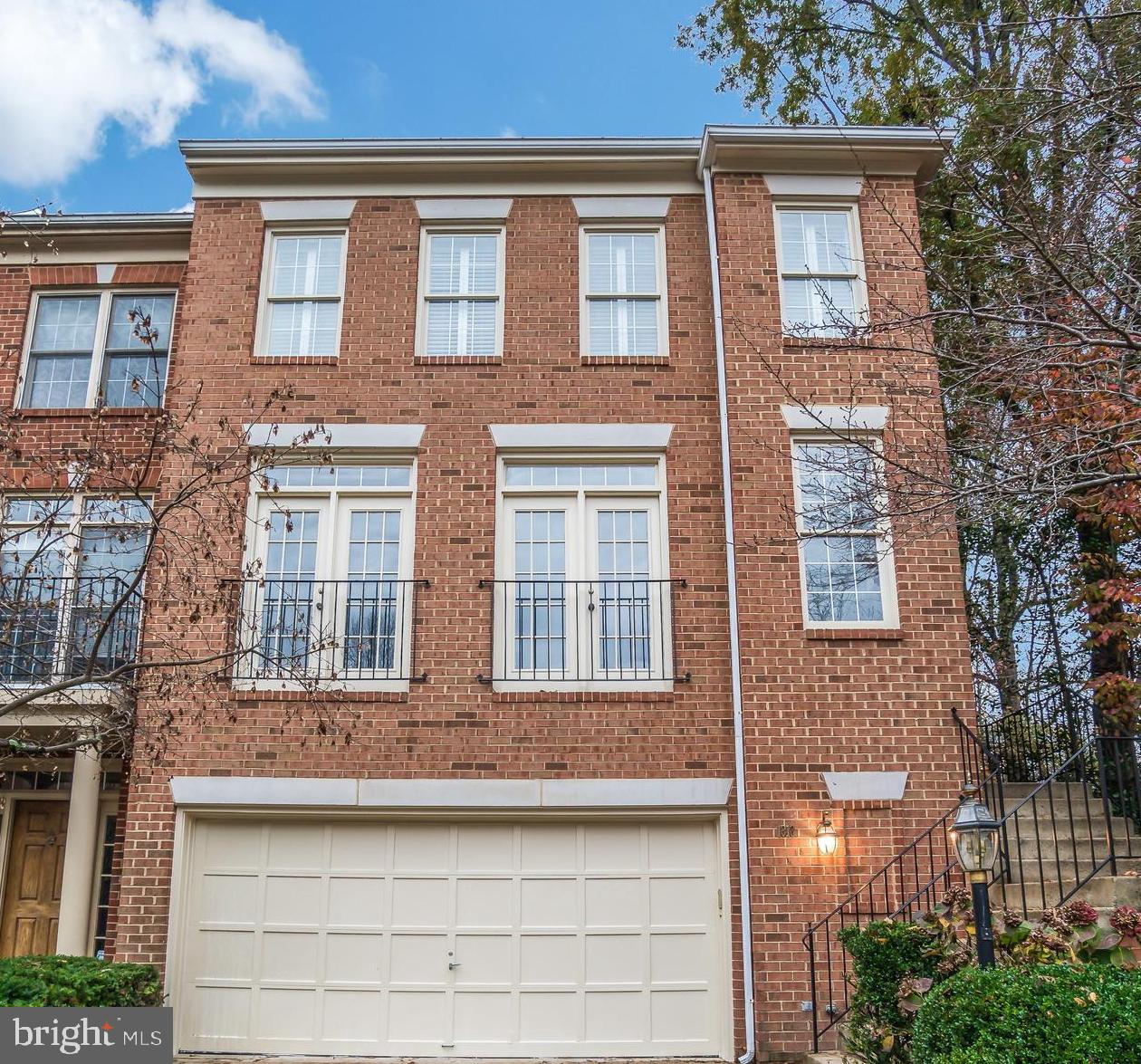 1318 Sundial Drive Reston, VA 20194 - Photo 1 of 52 3 level all brick WINTHROP model by Miller & Smith